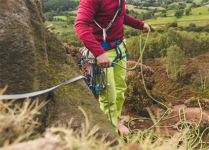 A man with a climbing harness